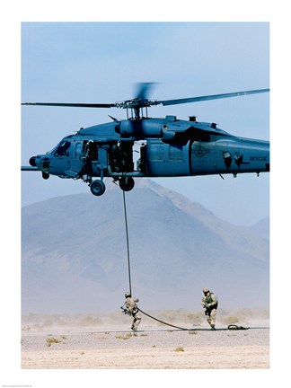 Framed Soldier rappelling from a military helicopter, Indian Springs Air Force Auxiliary Air Field, Nevada, USA Print