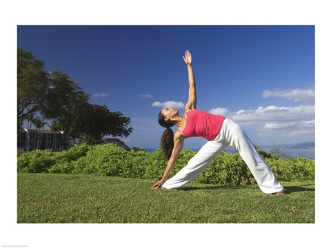 Framed Young woman practicing yoga, Maui, Hawaii, USA Print