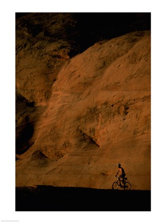 Framed Silhouette of a man mountain biking, Utah, USA Print