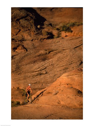 Framed High angle view of a man mountain biking, Moab, Utah, USA Print