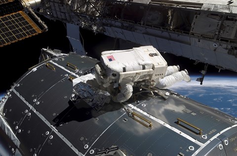 Framed Astronaut Works on the new Columbus Laboratory During a Spacewalk Print