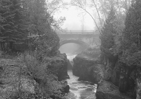 Framed Bridge Over Rocks Black And White Print