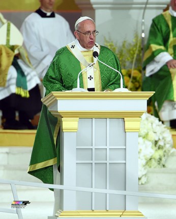 Framed Pope Francis celebrates an open-air mass at the Benjamin Franklin Parkway in Philadelphia, Pennsylvania, on September 27, 2015 Print