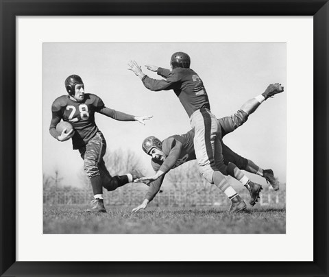 Framed Three Men Playing Football Print
