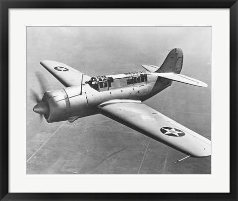 Framed High angle view of a fighter plane in flight, Curtiss SB2C Helldiver, December 1941 Print