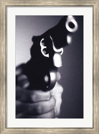 Framed Close-up of a person holding a handgun Print
