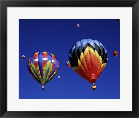 Framed Two Hot Air Balloons Flying Away Together Print