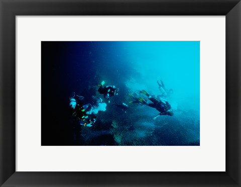 Framed Five scuba divers swimming underwater, Blue Hole, Belize Print