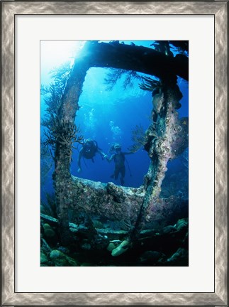 Framed Scuba diver investigating shipwrecks Print