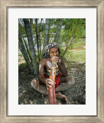 Framed Aborigine playing a didgeridoo, Cairns, Queensland, Australia Print