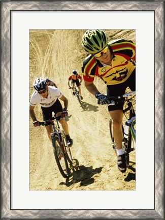 Framed Group of people riding bicycles in a race Print