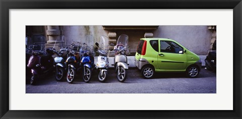 Framed Motor scooters with a car parked in a street, Florence, Italy Print