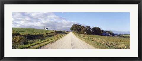Framed Dirt road leading to a church, Iowa, USA Print