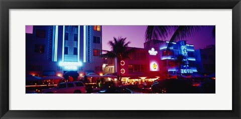 Framed Hotel lit up at night, Miami, Florida, USA Print