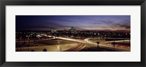 Framed Buildings in a city lit up at dusk, 7th St. Freeway, Phoenix, Maricopa County, Arizona, USA Print