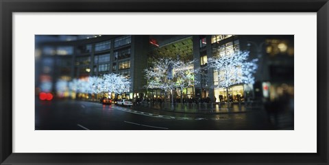 Framed Buildings lit up at the roadside, Columbus Circle, New York City, New York State, USA Print
