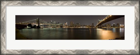 Framed Brooklyn Bridge and Manhattan Bridge across East River at night, Manhattan, New York City, New York State, USA Print