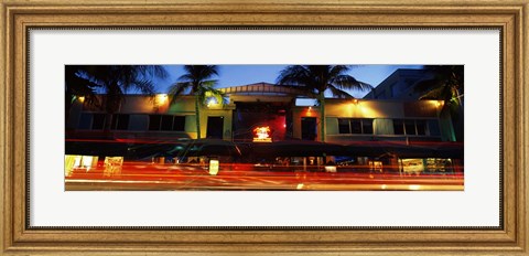 Framed Traffic in front of a building at dusk, Art Deco District, South Beach, Miami Beach, Miami-Dade County, Florida, USA Print