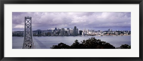 Framed Bridge across a bay with city skyline in the background, Bay Bridge, San Francisco Bay, San Francisco, California, USA Print