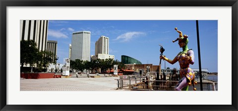 Framed Jester statue with buildings in the background, Riverwalk Area, New Orleans, Louisiana, USA Print