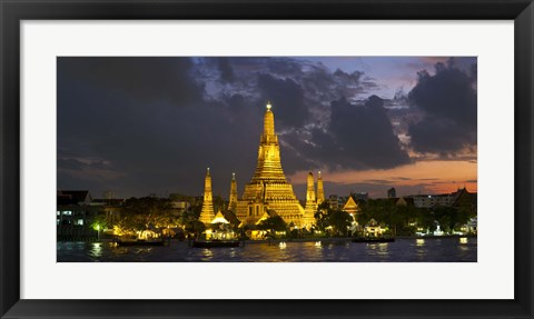 Framed Buddhist temple lit up at dawn, Wat Arun, Chao Phraya River, Bangkok, Thailand Print