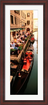 Framed Gondolas moored outside of a cafe, Venice, Italy Print
