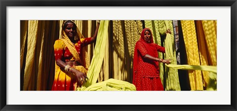 Framed Portrait of two mature women working in a textile industry, Rajasthan, India Print