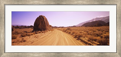 Framed Dirt road passing through an arid landscape, Californian Sierra Nevada, California, USA Print