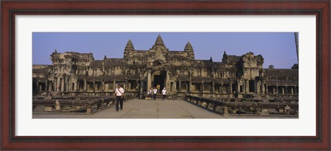 Framed Tourists walking in front of an old temple, Angkor Wat, Siem Reap, Cambodia Print