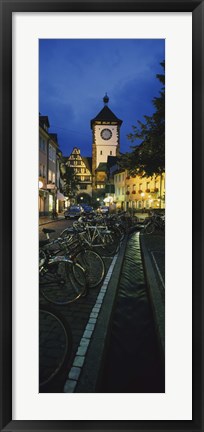 Framed Bicycles parked along a stream near a road, Freiburg, Baden-Wurttemberg, Germany Print