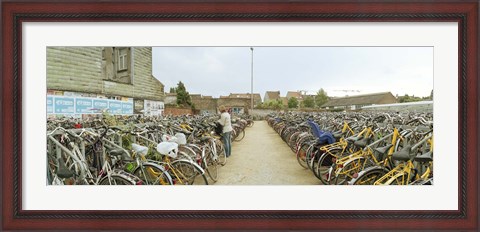 Framed Bicycles parked in the parking lot of a railway station, Gent-Sint-Pieters, Ghent, East Flanders, Flemish Region, Belgium Print