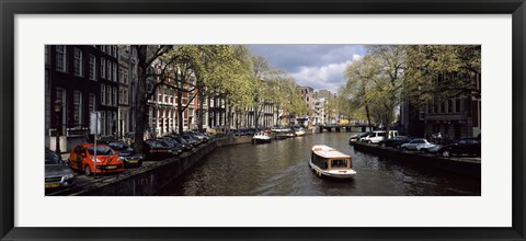 Framed Close up of Boats in a canal, Amsterdam, Netherlands Print
