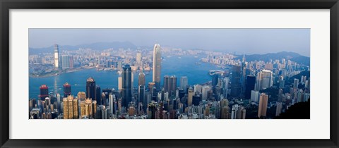 Framed Skyscrapers in a city, Victoria Harbour, Hong Kong, China Print