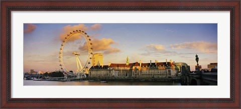 Framed Ferris wheel with buildings at waterfront, Millennium Wheel, London County Hall, Thames River, South Bank, London, England Print