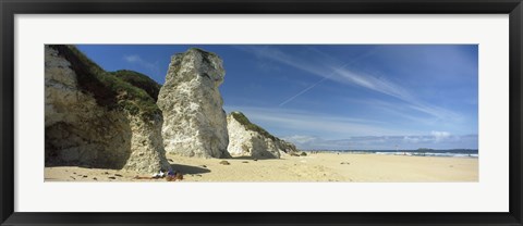 Framed Rock formations on the beach, White Rock Bay, Portrush, County Antrim, Northern Ireland Print