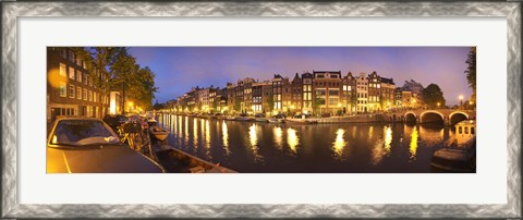 Framed Night view along canal, Amsterdam, Netherlands Print