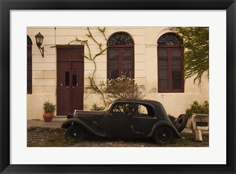 Framed Vintage car parked in front of a house, Calle De Portugal, Colonia Del Sacramento, Uruguay Print