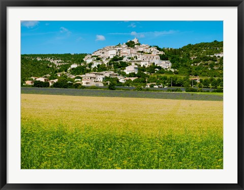 Framed Farm with a town in the background, Simiane-La-Rotonde, Alpes-de-Haute-Provence, Provence-Alpes-Cote d&#39;Azur, France Print