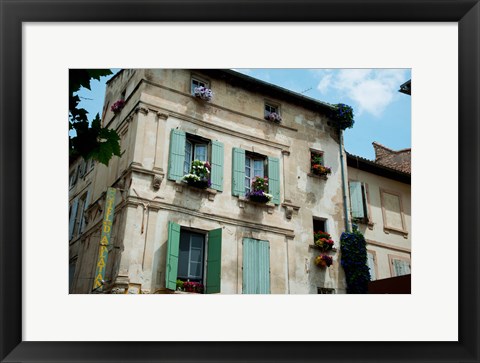 Framed View of an old building with flower pots on each window, Rue Des Arenes, Arles, Provence-Alpes-Cote d&#39;Azur, France Print