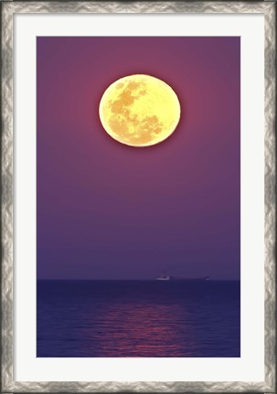 Framed Thunder&#39;s Moon and its reflection above the water Print