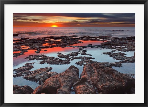 Framed Tidal pools reflect the sunrise colors during the autumn equinox Print