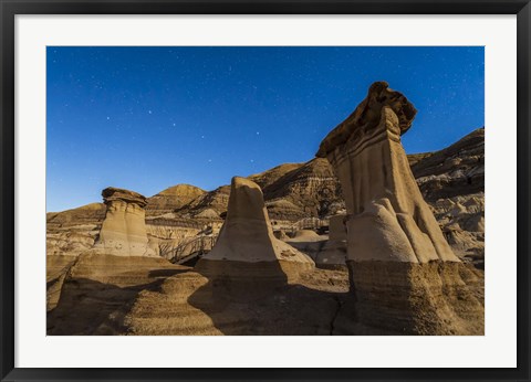 Framed Stars over the hoodoos in the Red Deer River valley, Alberta, Canada Print