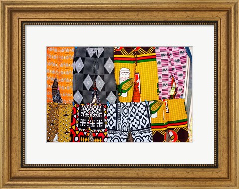 Framed Africa, Angola, Benguela. Bright colored pants for sale at local shop. Print