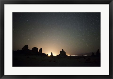 Framed Large tufa formations at Trona Pinnacles against a backdrop of stars Print