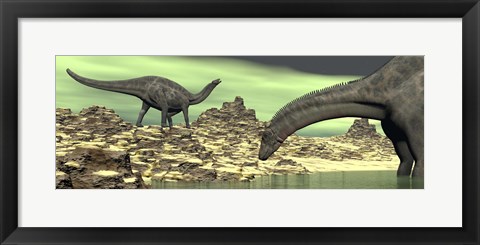 Framed Two Dicraeosaurus dinosaurs in a desert landscape Print