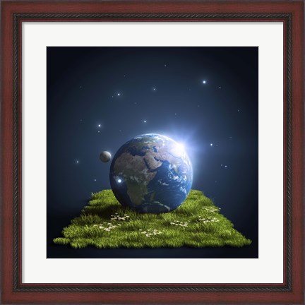 Framed Planet Earth lying on a green lawn with moon and stars Print