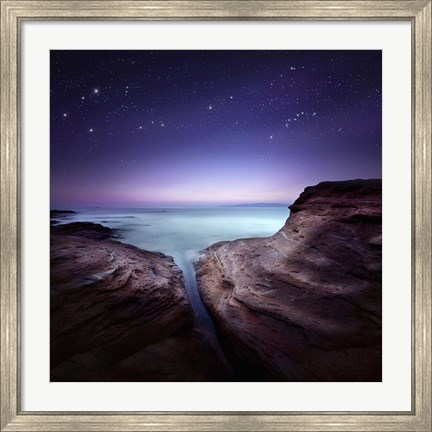 Framed Two large rocks in a sea, against starry sky Print