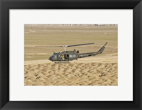 Framed Italian Army AB-205MEP Utility Helicopter Over Shindand, Afghanistan Print