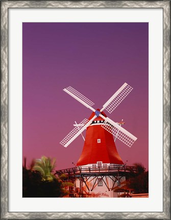 Framed Mill Resort against pink sky, Oranjestad, Aruba Print