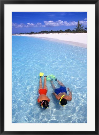 Framed Snorkeling in the blue waters of the Bahamas Print